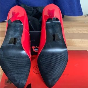 Red high heel shoes